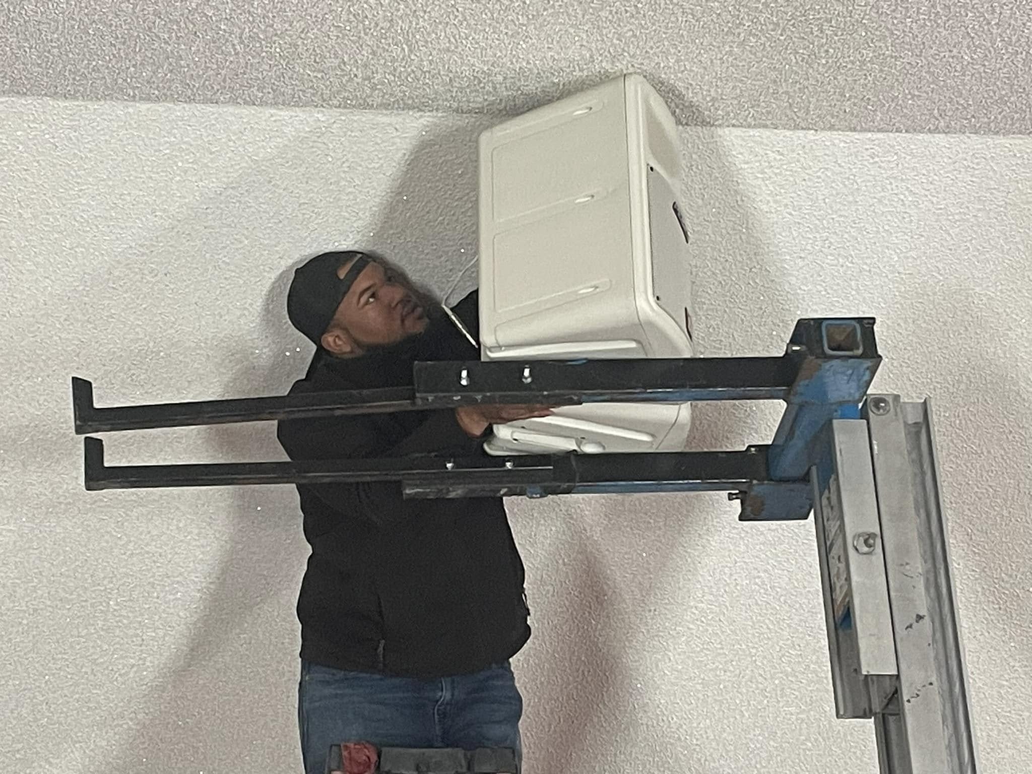 Church installation work using a lift